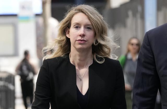 FILE - Former Theranos CEO Elizabeth Holmes leaves federal court in San Jose, Calif., March 17, 2023. On Monday, April 10, Holmes was rebuffed in her attempt to stay out of federal prison while she appeals her conviction for the fraud she committed while overseeing a blood-testing scam that exposed Silicon Valley’s dark side. (AP Photo/Jeff Chiu, File)