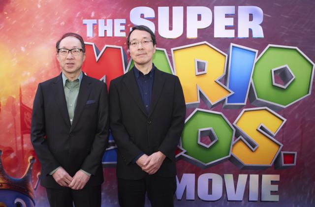 Takumi Kawagoe, left, and Kaji Kondo arrive at the premiere of "The Super Mario Bros. Movie," Saturday, April 1, 2023, at Regal LA Live in Los Angeles. (Photo by Allison Dinner/Invision/AP)
