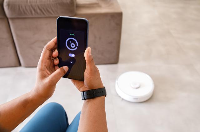 Family interacting with smart home devices on daily activities