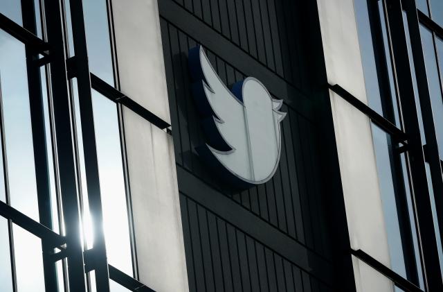 FILE - A Twitter logo hangs outside the company's offices in San Francisco, on Dec. 19, 2022. Twitter experienced a bevy of glitches Monday, March 6, 2023 as links stopped working, some users were unable to log in and images were not loading for others. (AP Photo/Jeff Chiu, File)