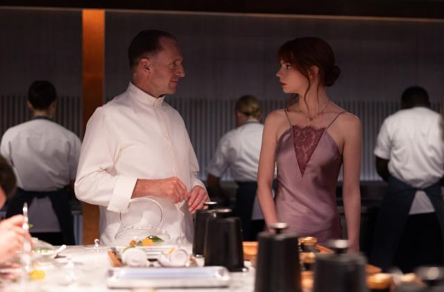 Ralph Fiennes and Anya Taylor-Joy in the film The Menu.