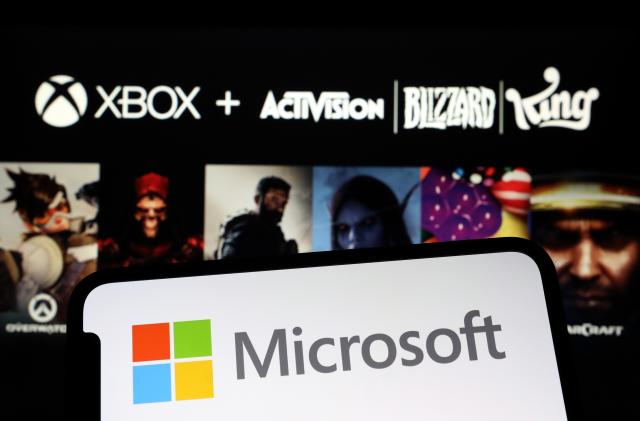 ANKARA, TURKIYE - JANUARY 18: In this photo illustration, the logos of Microsoft and Activision Blizzard are displayed in Ankara, Turkiye on January 18, 2022. (Photo by Hakan Nural/Anadolu Agency via Getty Images)