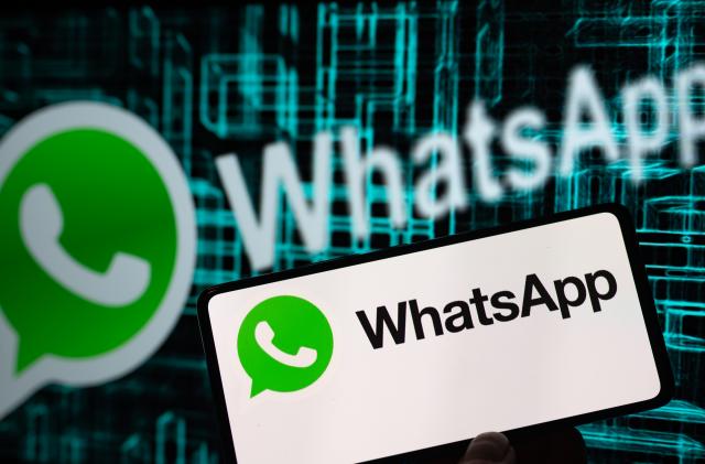 WhatsApp mobile app displayed on phone with WhatsApp on screen in this photo illustration. On 26 January 2023 in Brussels, Belgium. (Photo illustration by Jonathan Raa/NurPhoto via Getty Images)