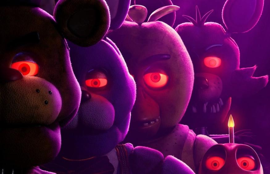 Five Nights at Freddy's movie poster, featuring four animatronic figures with glowing eyes.