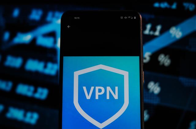 POLAND - 2021/06/15: In this photo illustration a VPN logo displayed on a smartphone with stock market percentages on the background. (Photo Illustration by Omar Marques/SOPA Images/LightRocket via Getty Images)