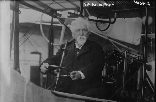 View of American-born British inventor Sir Hiram Maxim (1840 - 1916) behind the steering wheel of an unidentified vehicle, Washington DC, 1915. (Photo by PhotoQuest/Getty Images)