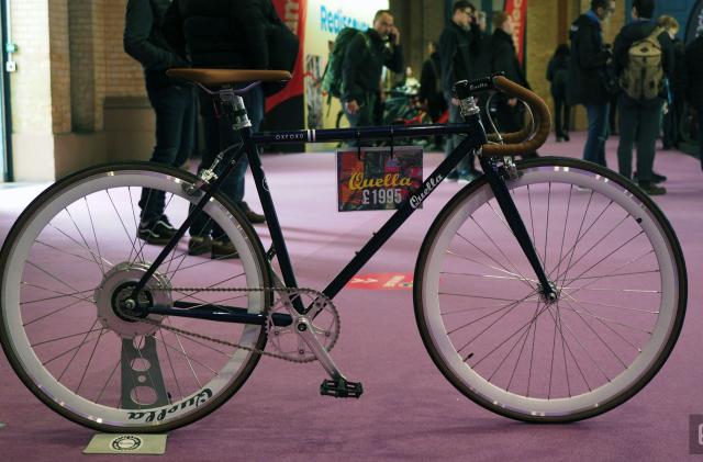 Image of Quella's Varsity retro e-bike on a stand at the London Cycle Show.