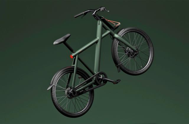 A rendering of the VanMoof X4 e-bike in green colorway floats in a dark green void.