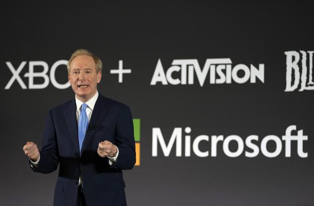 FILE - Microsoft President Brad Smith addresses a media conference regarding Microsoft's acquisition of Activision Blizzard and the future of gaming in Brussels, Tuesday, Feb. 21, 2023. Microsoft's charm offensive with the world's governments is starting to lose some of its charm as the software giant is confronting some of its toughest antitrust scrutiny since co-founder Bill Gates was in charge. (AP Photo/Virginia Mayo, File)